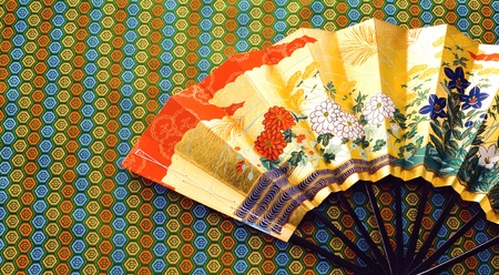 Japanese image of japanese fan on kimono textureのeditorial素材