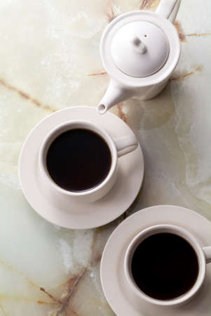coffe cup , milk and pot on marble backgroundの写真素材
