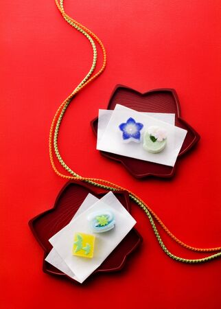 japanese confectionery on tray and paperの写真素材