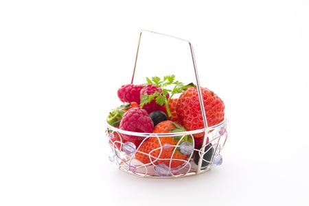 many strawberry and berry in basketの写真素材