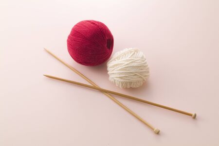 ball of yarn on pink backgroundの写真素材