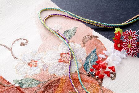Japanese kimono, cords and ornamental hairpinの写真素材