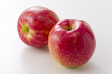 fresh two apples on white backgroundの写真素材