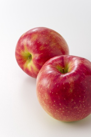 fresh two apples on white backgroundの写真素材