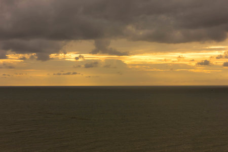 Cloudy sky before the storm in the oceanの写真素材