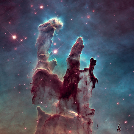 The Pillars of Creation. The Eagle Nebula or M16 or NGC 6611 is a young open cluster of stars in the constellation Serpens. Retouched image with small DOF.の素材 [FY310112976240]