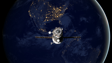 Spacecraft Progress orbiting the earth. Elements of this image furnished by NASA.の写真素材