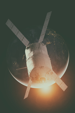 Cargo spacecraft - The Automated Transfer Vehicle over the planet Earth. Elements of this image furnished by NASA.の写真素材