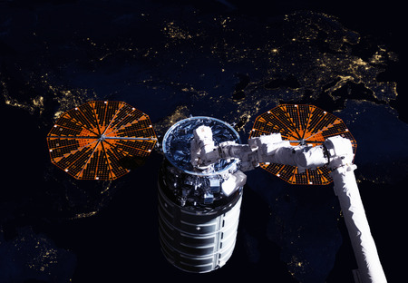 The Cygnus spacecraft in open space. Elements of this image furnished by NASA.の写真素材