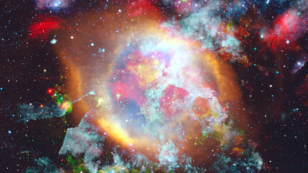 Star field and nebula in deep space many light years far from planet Earth.の写真素材