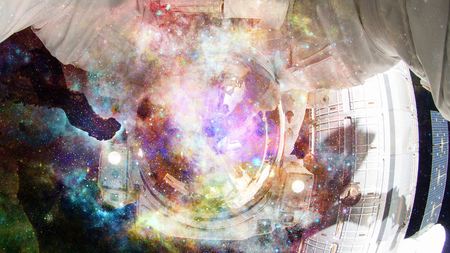 Astronaut in outer space. Science fiction art. Elements of this image furnished by NASA.の写真素材