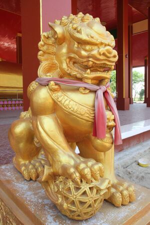 Golden lion statue on vintageの写真素材