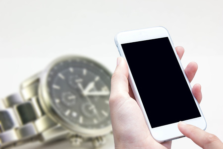 woman hand hold and touch screen smart phoneの写真素材