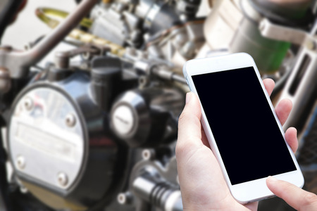 woman hand hold and touch screen smart phoneの写真素材