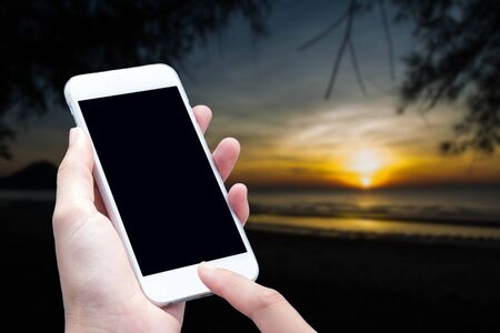 woman hand hold and touch screen smart phoneの写真素材