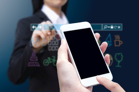 woman hand hold and touch screen smart phone