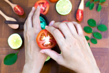 Lemon and tomato for hand  beauty scrubbingの写真素材