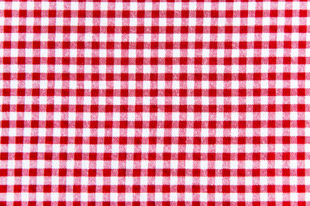 Red checkered tablecloth texture. Abstract background and texture for design.の写真素材