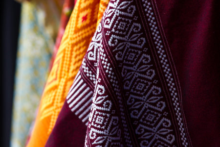 Detail of traditional thai clothes in a market, Thailand.の写真素材