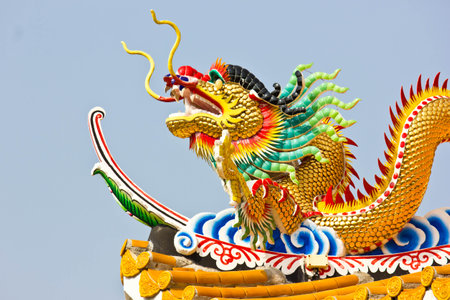 Chinese dragon statue on the roof of Chinese temple, closeup of photoの写真素材
