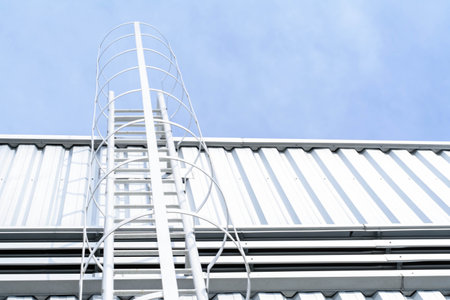 Ladder on the roof of a building, closeup of photoの写真素材