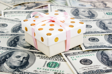 Gift box and lots of dollars.