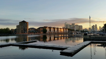London sunrise over dock and cityの素材