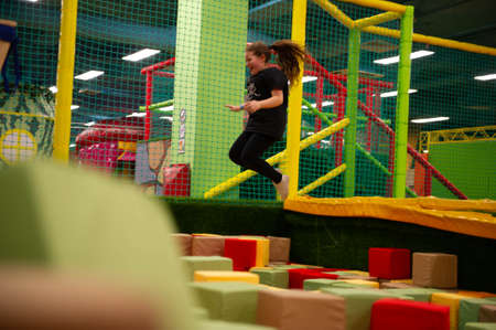 Children play a variety of games in fun room