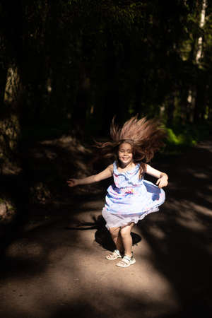 Close up portrait of little beautiful cutie princess girl with emotional faceの写真素材
