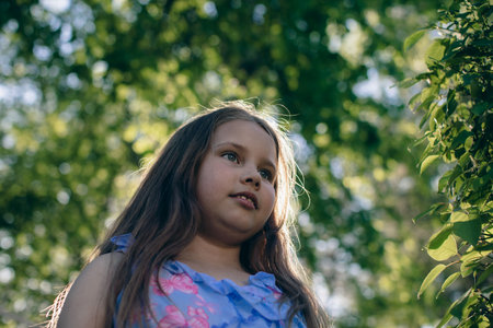 Close up portrait of little beautiful cutie princess girl with emotional face