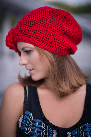 The girl in yellow knitted beretの写真素材