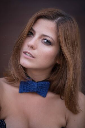 Pretty girl in bow tieの写真素材