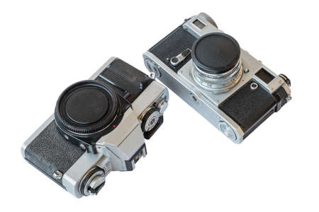 Old vintage black and silver cameras on white background, isolatedの写真素材