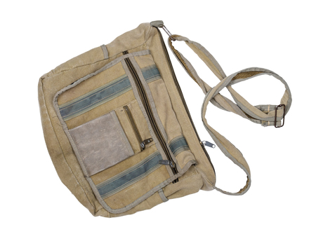 old canvas brown bag on a white background, isolatedの写真素材