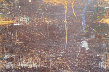 Brown grunge dirty scratched wooden surfaceの写真素材