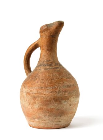 A traditional Georgian clay wine jug on a whiteの写真素材
