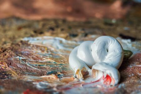 Wed oil paint on the palette, selective focusの写真素材