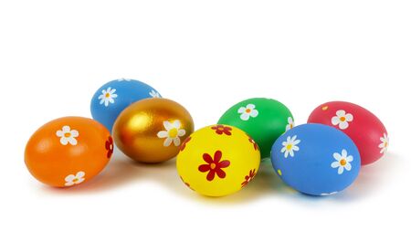 Colorful painted Easter eggs on the white surface