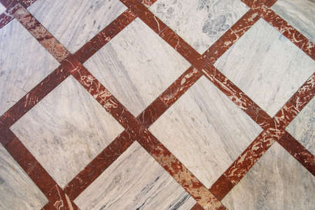Old marble floor tiles, geometric pattern surface of marble floor の写真素材