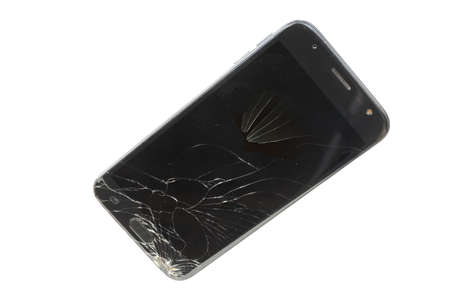 Black phone with broken screen isolated on a white background
