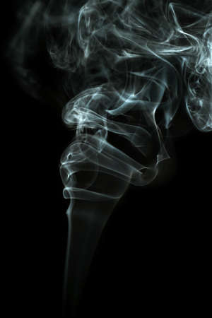 Abstract shape smoke in motion on a black backgroundの写真素材