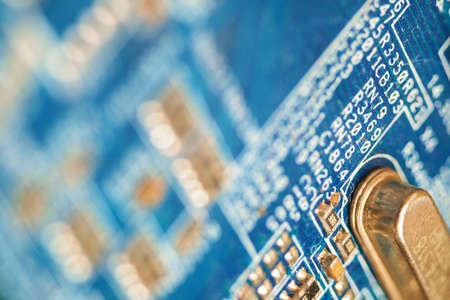 A blue electronic circuit board background, close up selective focusの写真素材