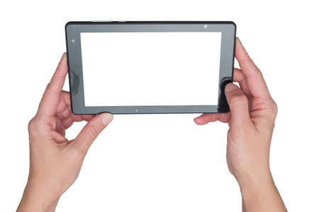 Hands holding tablet and taking photo, isolated on white backgroundの写真素材