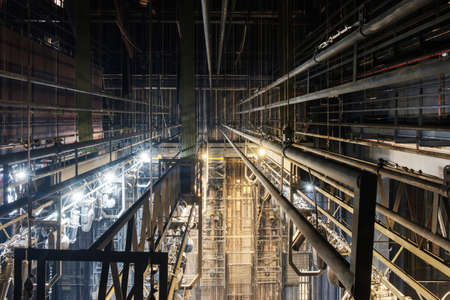 Technical equipment at the backstage of theater. Stage spot lighting rigging structure for a live...