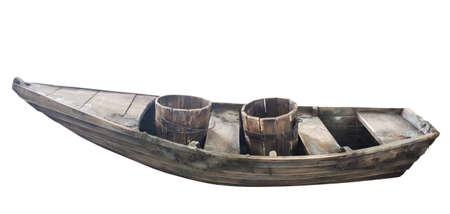 Wooden buckets in decorative wooden boat on white background