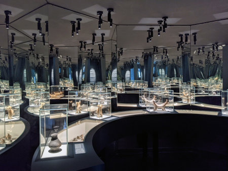 Vani, Georgia 7 August 2021. Vani Archeological Museum. Dark interior of a museum with mirrors.のeditorial素材