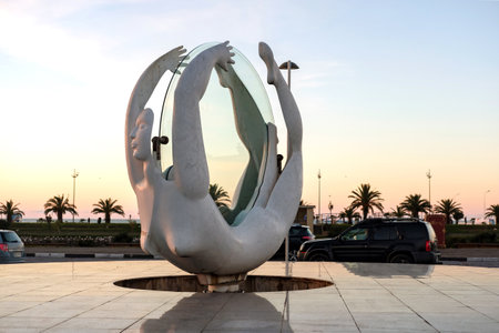 Batumi, Georgia, February, 12, 2018.  .Sculpture "Rotation" in Batumi. Moving statue made with metal and glass is a symbol of constantly changing times.のeditorial素材