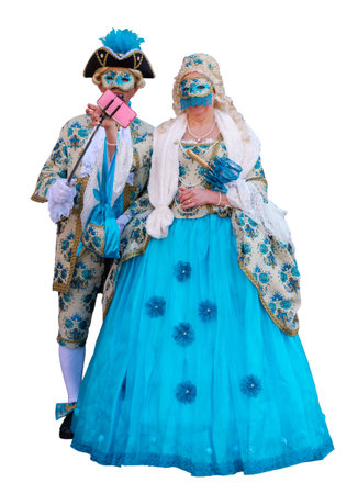 Masked and dressed up couple posing and taking selfie. Isolated on white backgroundの写真素材