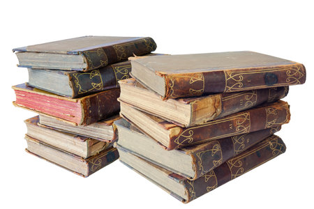 Piles of old books isolated on a white backgroundの写真素材