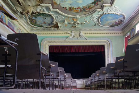 Shroma, Georgia, October, 9, 2023: Abandoned and ruined theater stage with paintings